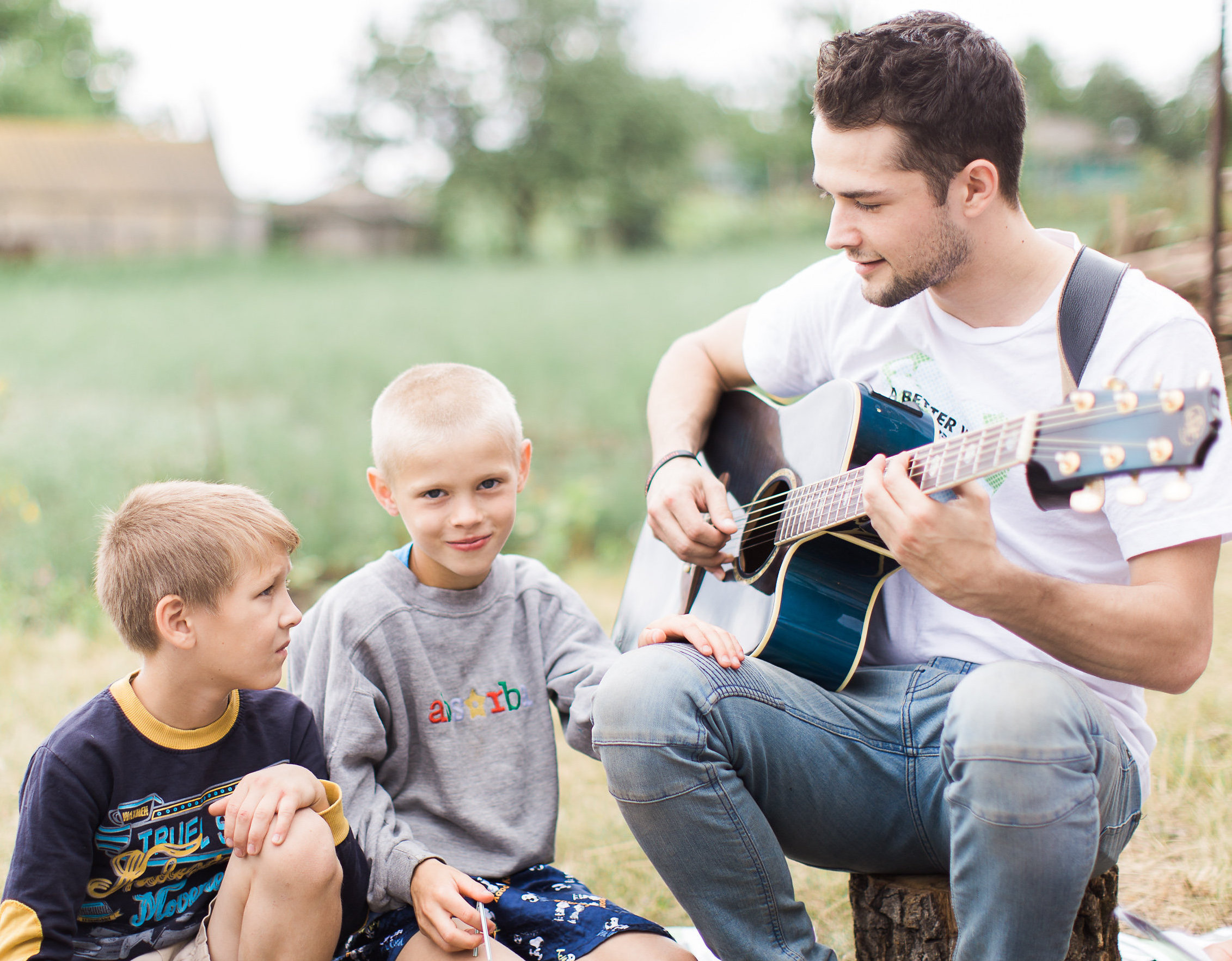 School Without Walls leader with children at a summer Bible camp