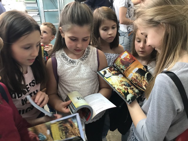 Children in Ukraine receiving Action Bible New Testaments