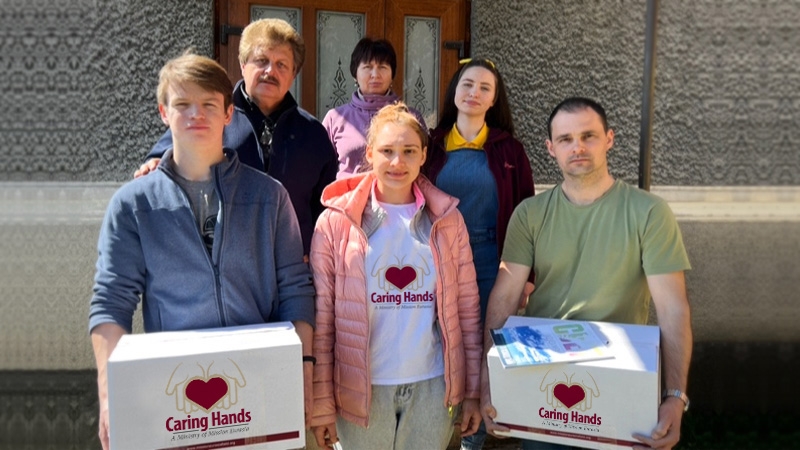 group with caring hands good boxes