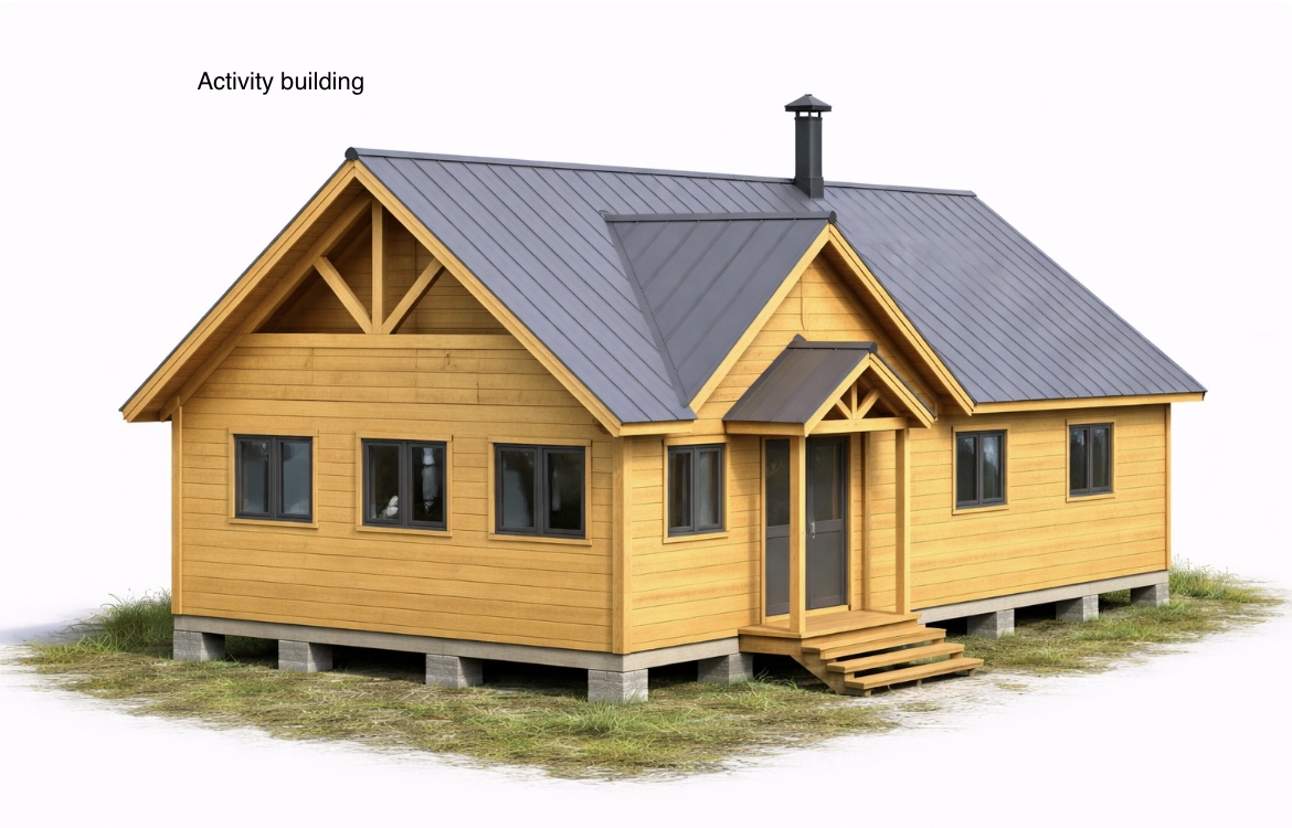 A newly constructed wooden activity building with a gray metal roof at the Meadow of Hope Center.