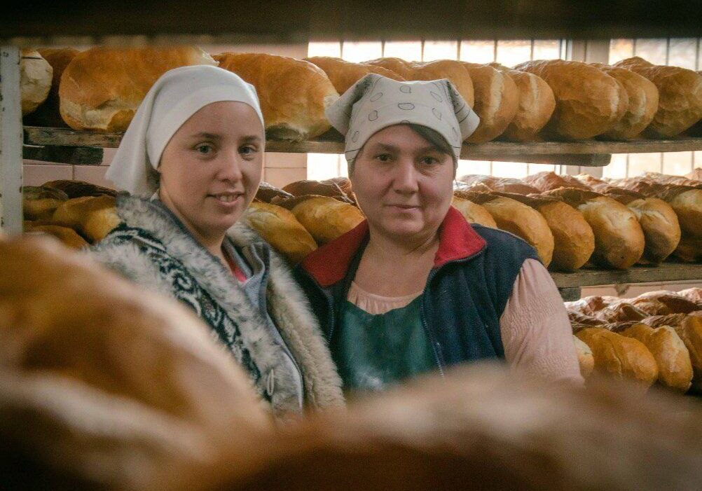 give to Bread of Life Bakeries two women at Bread of Life Bakeries